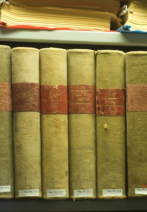 Book volumes on shelf