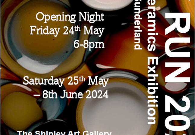The exhibition poster with bits of fused glass in the backdrop
