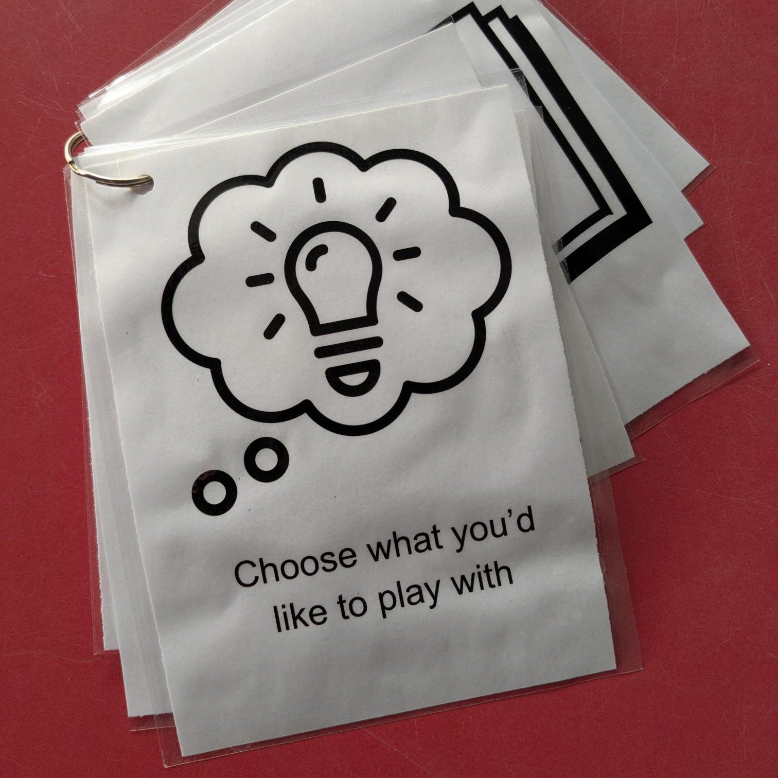 A prompt card. It says 'Choose what you'd like to play with'.