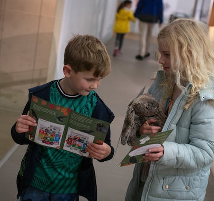 Two children doing a museum trail 