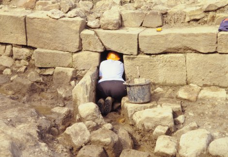 archaeological dig under the wall