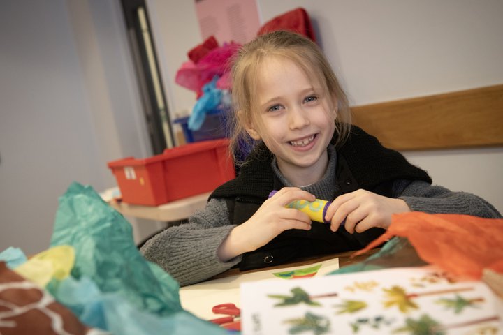 A child is crafting.