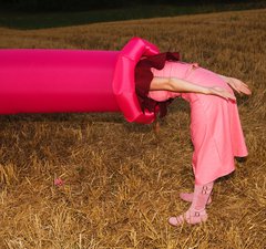 A person leans into a inflatable tube