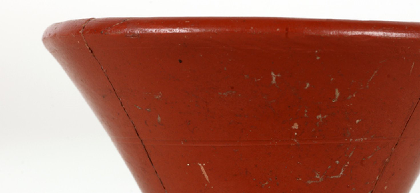 This is a samian drinking cup, imported from Franc