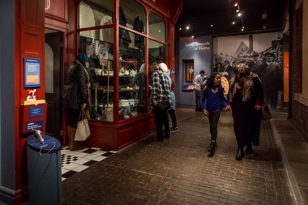 A group of visitors exploring a recreated historic street in South Shields Museum & Gallery A group of visitors exploring a recreated historic street in South Shields Museum & Gallery
