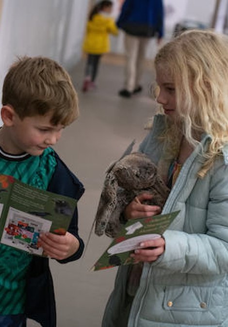 Two children doing a museum trail 