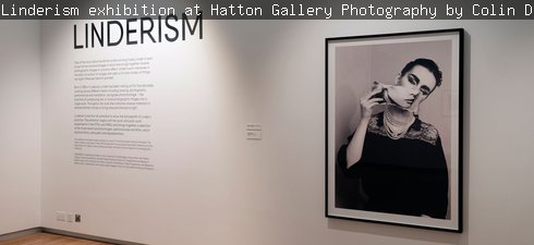 Photo of Linderism exhibition featuring a black and white photomontage and the exhibition intriduction