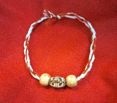 Roman style bracelet made of string and beads