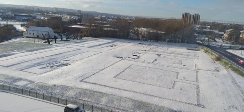 Outline of Roman fort seen through light covering of snow