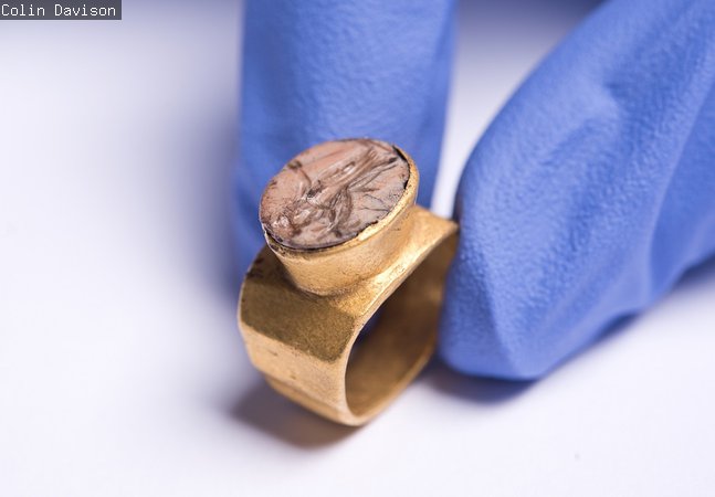 A gold ring with gem engraved with Roman goddess Fortuna