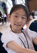 smiling girl does crafts