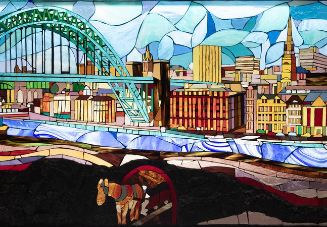 Glass painting of the Tyne Bridge and mining past