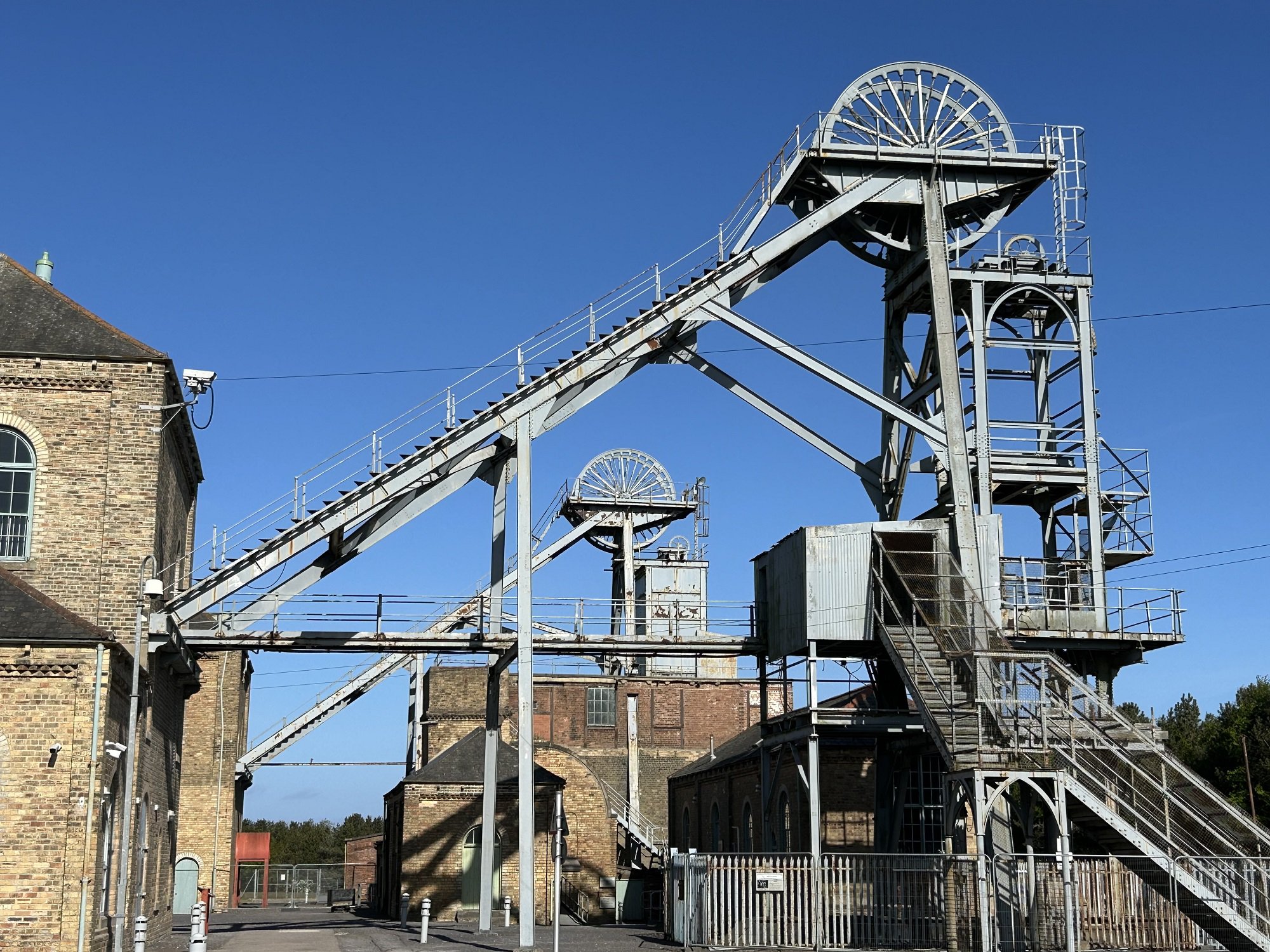 Two large metal mining structures at a fomer colliery.