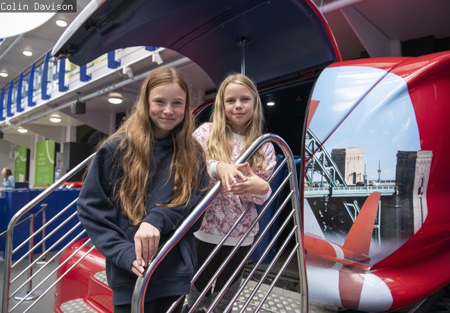 two sisters at Red Arrows simulator