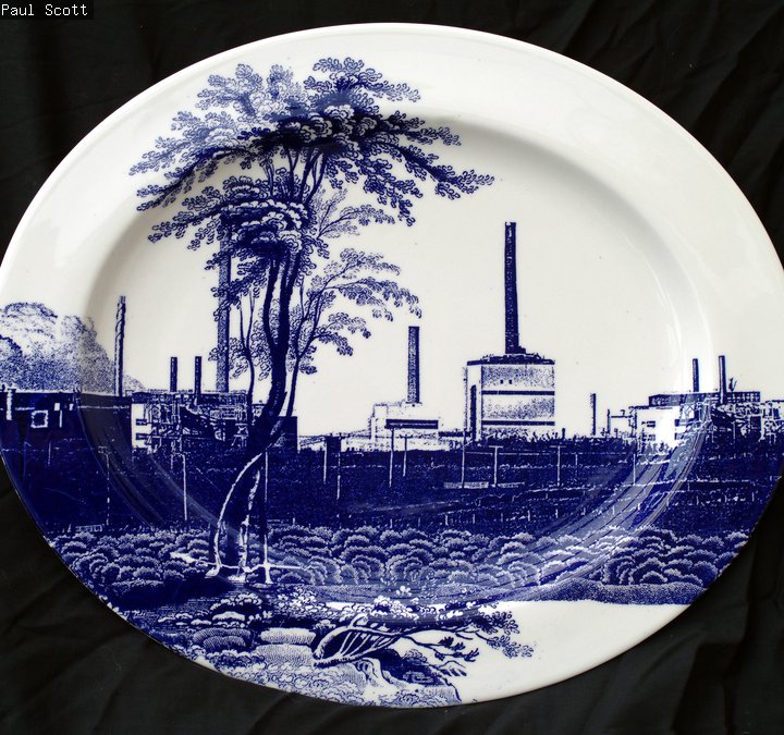 Cumbrian Blue(s), Sellafield No:9, 5/5. Transfer print collage on bone china platter with platinum, 410mm x 345mm x 24mm. Paul Scott 2005.