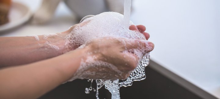 person washing hands