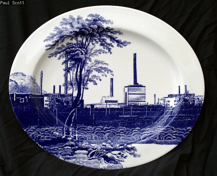 Cumbrian Blue(s), Sellafield No:9, 5/5. Transfer print collage on bone china platter with platinum, 410mm x 345mm x 24mm. Paul Scott 2005.