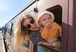 Woman and baby riding Heritage Train