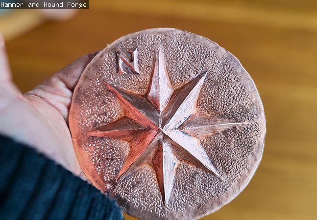 Emboss design on metal. 