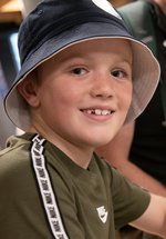 boy smiling doing crafts