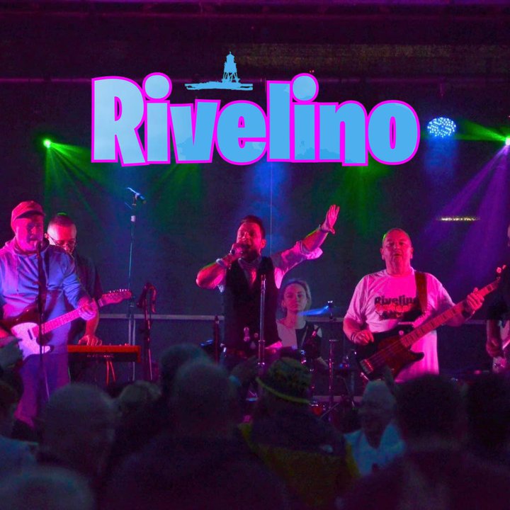 Members of a rock band in concert