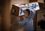 Young child at a museum interactive 