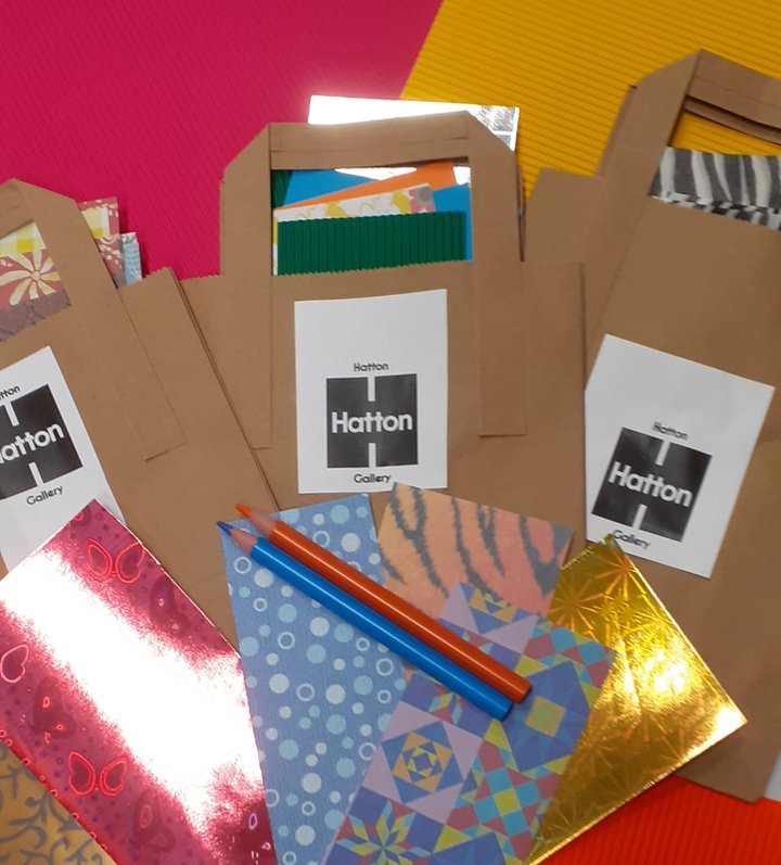 A photograph of some craft materials and Hatton branded paper bags