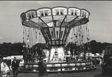 Archive photograph of a merry-go-round at a funfair