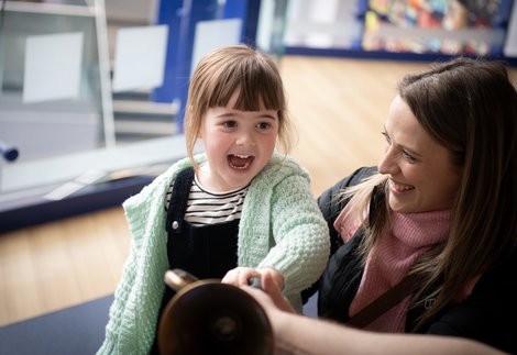 Little girl with mum in Discovery Museum