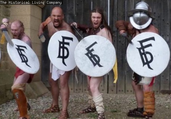 4 Gladiators with swords and shields ready for battle in front of the West Gate
