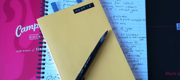 image includes two notebooks